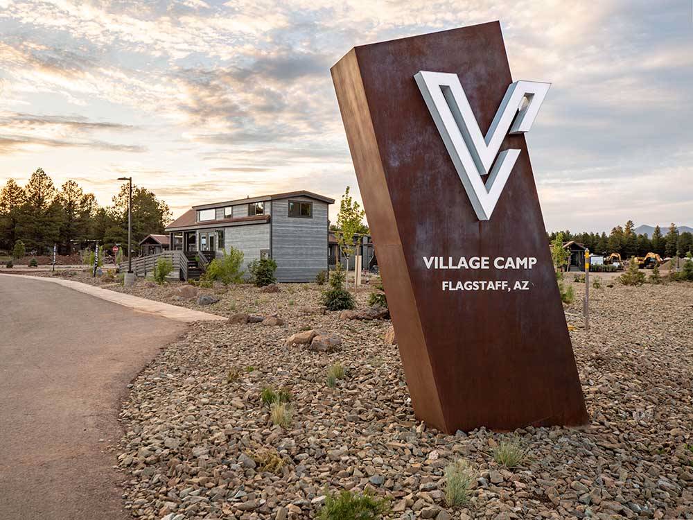 The front entrance sign at VILLAGE CAMP FLAGSTAFF