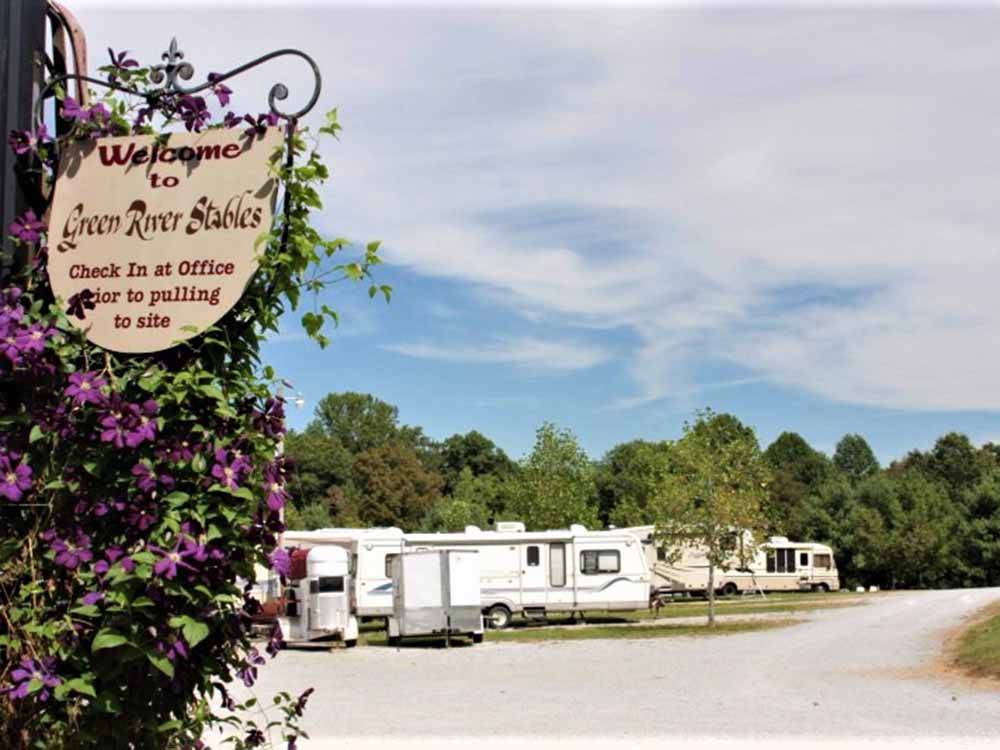 The front entrance sign at QUIET WOODS GREEN RIVER STABLES HORSE CAMP  RV PARK