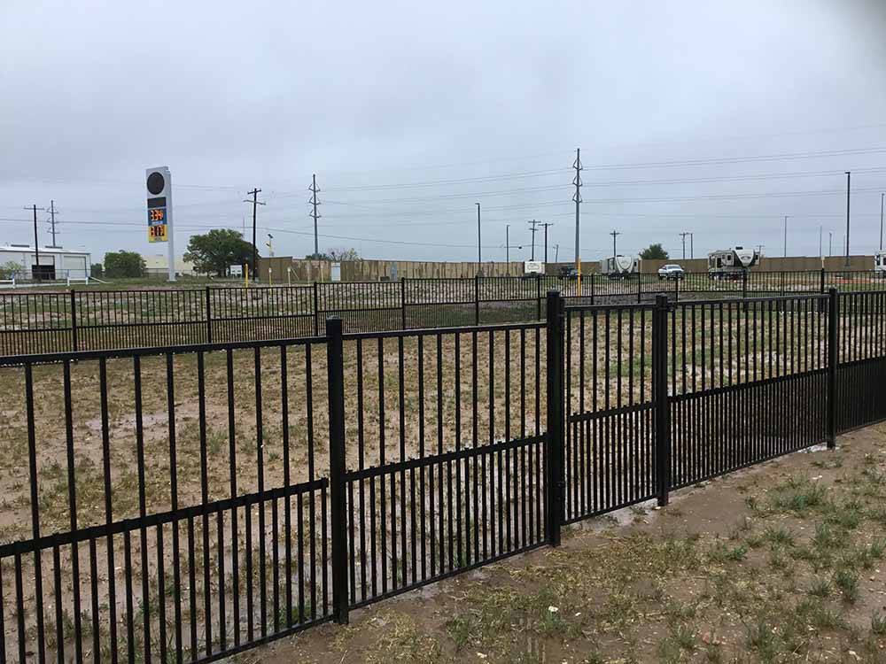 The fenced in pet area at LANDMARK TRAVEL CENTER RV PARK