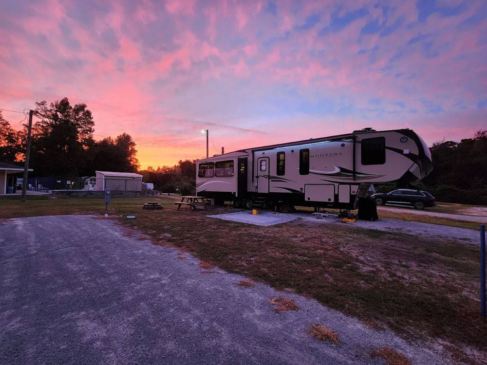 An RV site at dusk