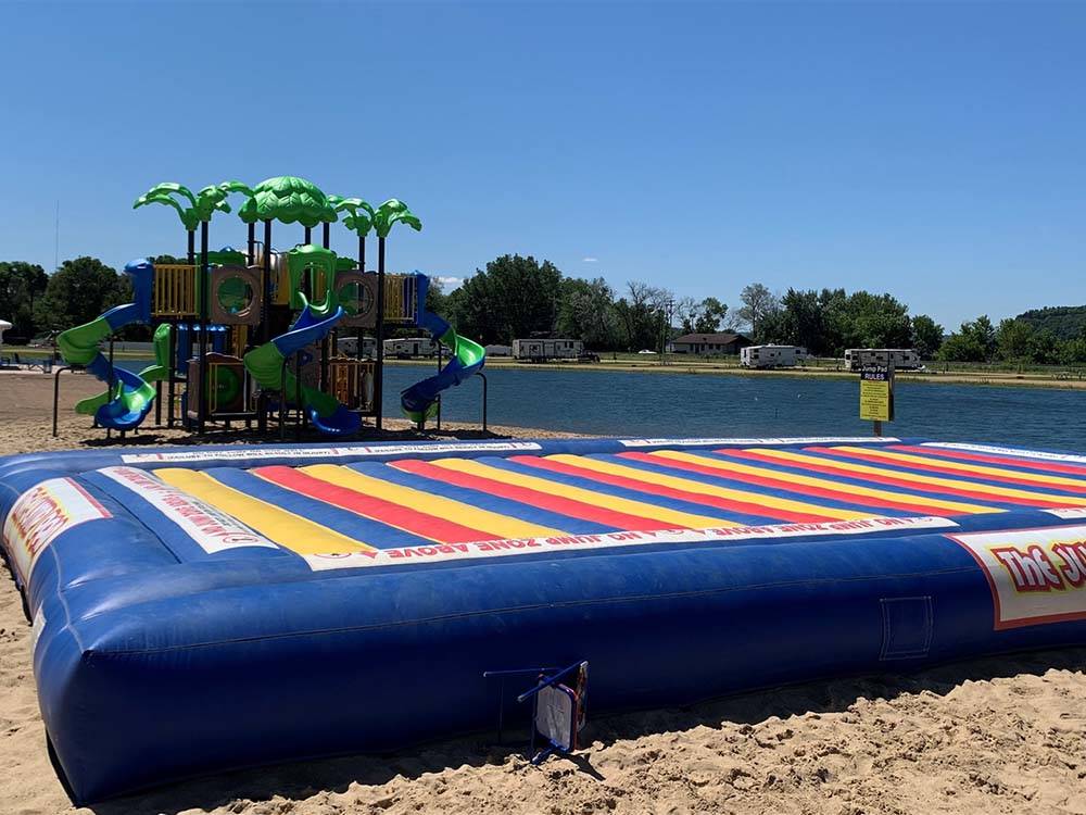 The jumping pillow and playground at COCONUT COVE RV RESORT BY RJOURNEY