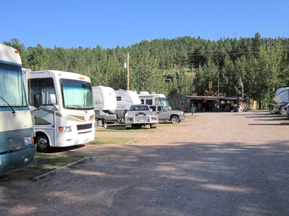 A row of gravel RV sites at FRENCH CREEK RV PARK AND CAMPGROUND