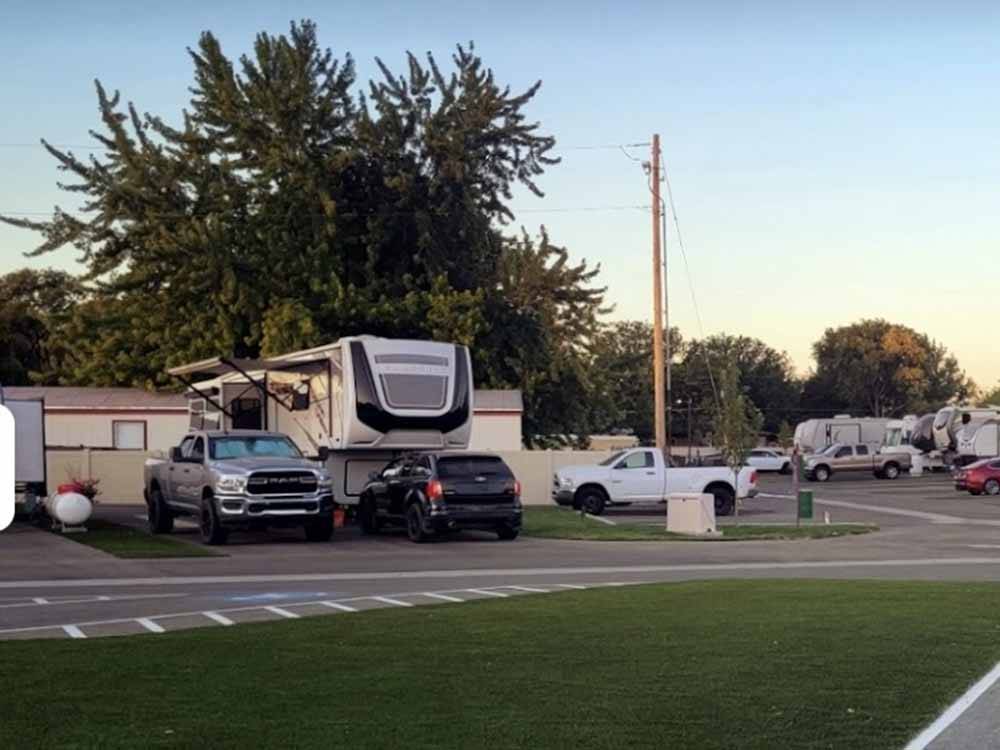 A group of back in RV sites at CENTER POINT RV PARK