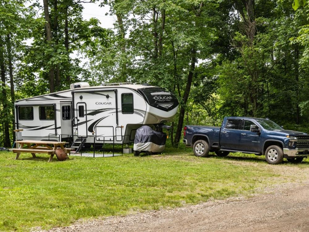 Parked trailer next to pick up truck at Lake Wapusun RV Resort