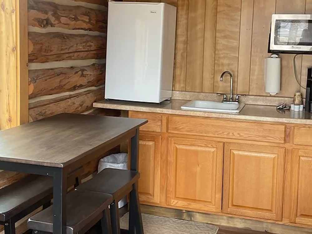 The kitchen area in the log cabin at HOVER CAMP