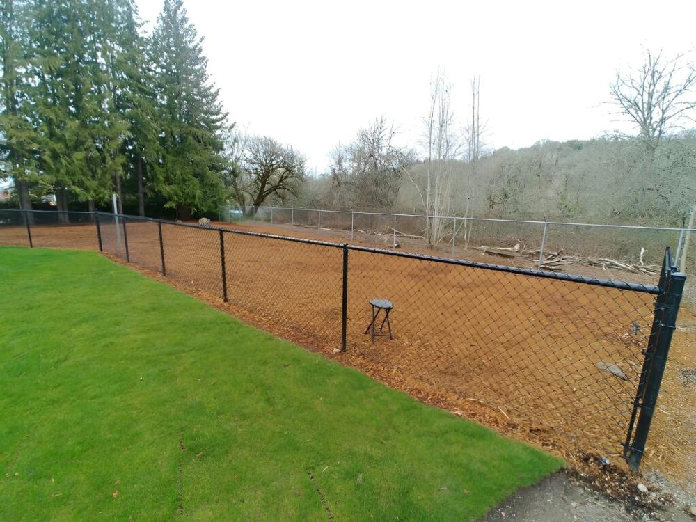 Open grass area at site Valley's Edge RV Park