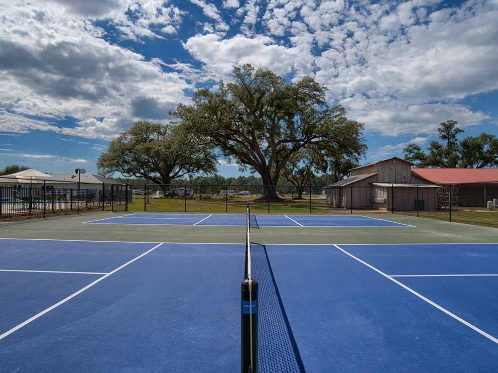 A wide view of the pickleball courts at GULF SHORES RV RESORT