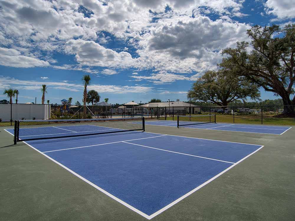 The pickleball courts near the outdoor pool at GULF SHORES RV RESORT