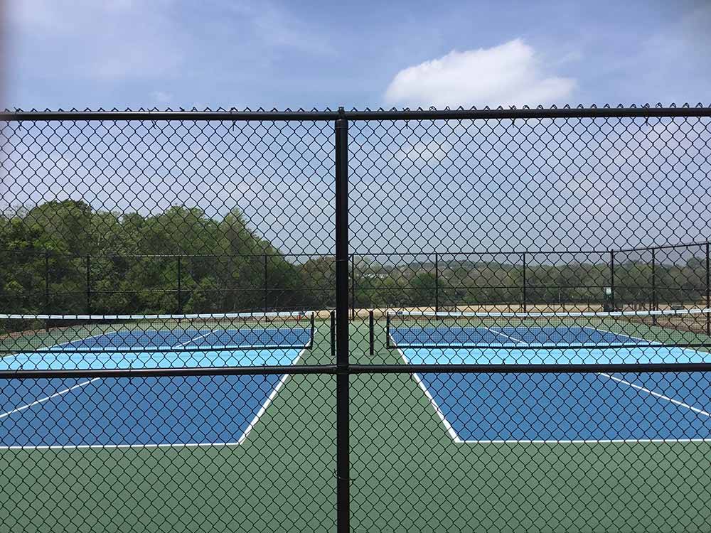 The pickleball courts at THE HILL TOP AT BRENHAM RV RESORT