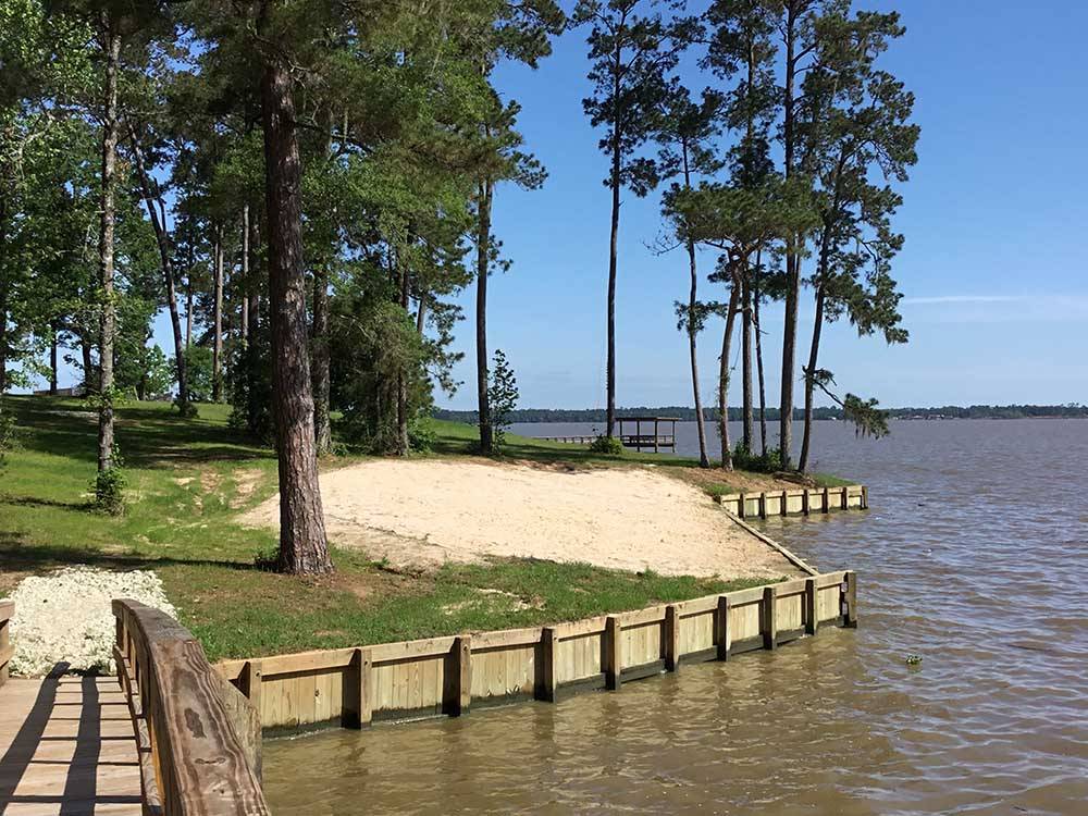 Sand by the lakefront at THE PRESERVE RV PARK