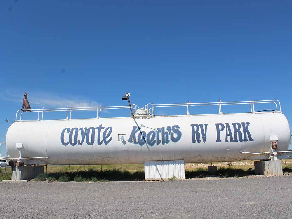 The park name on a large propane tank at COYOTE KEETH'S RV PARK