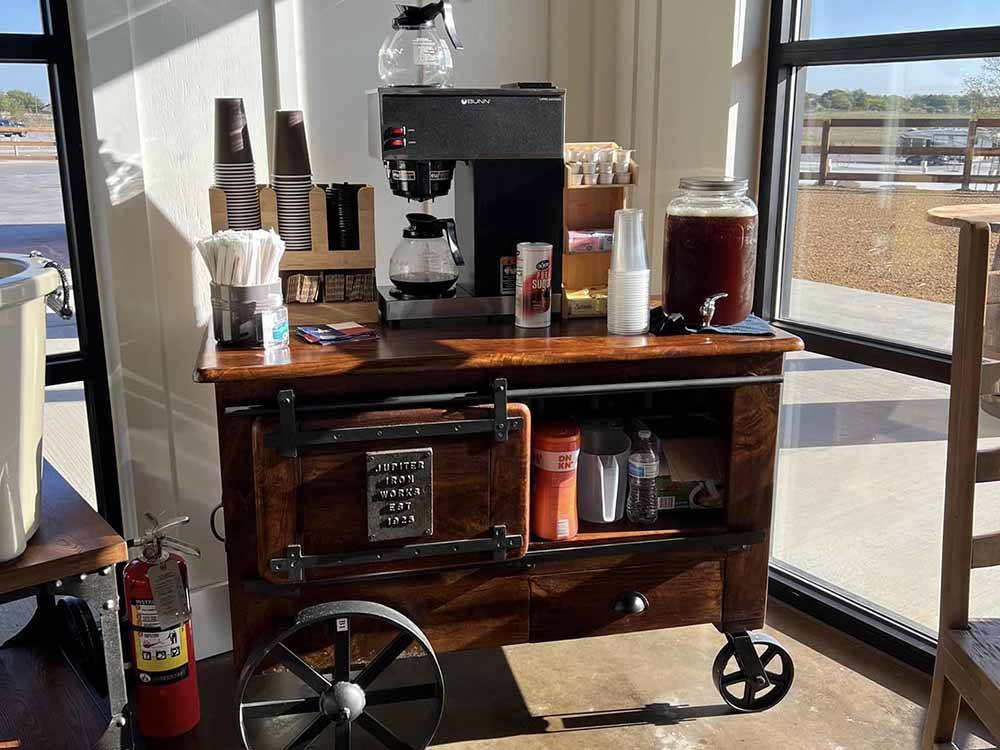 The complimentary coffee cart at YELLOW ROSE RV RESORT