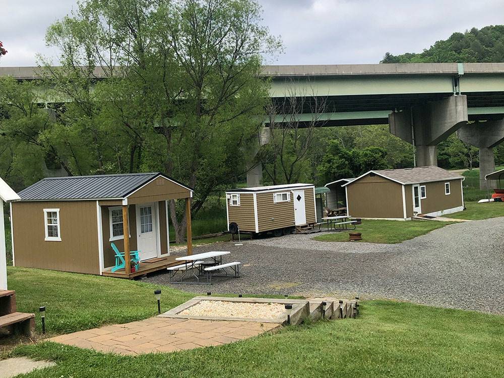 A row of the cabin rentals at NEW RIVER BRIDGE FAMILY CAMPGROUND