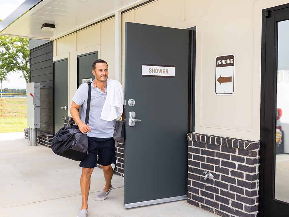 A man walking out of the shower building at LOVE'S RV STOP - 801