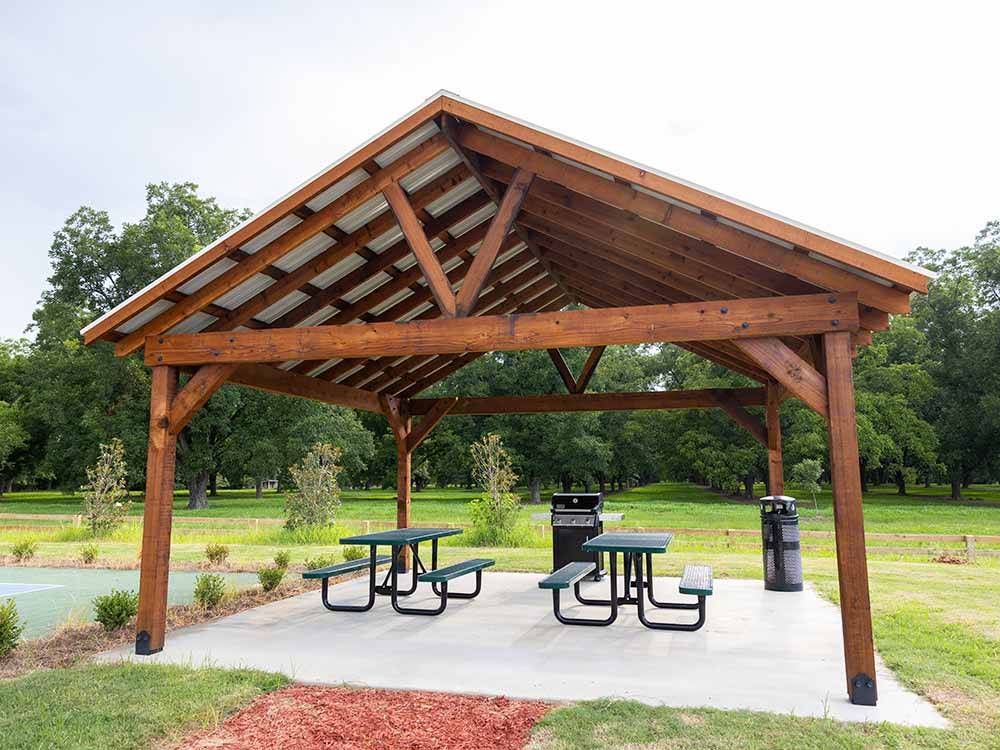 Picnic tables under a pavilion at LOVE'S RV STOP - 801