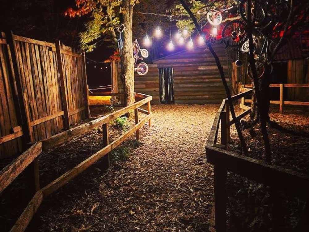 Bicycles hanging from a wire for Haunted Hill at RINGLER FAMILY CAMPGROUND