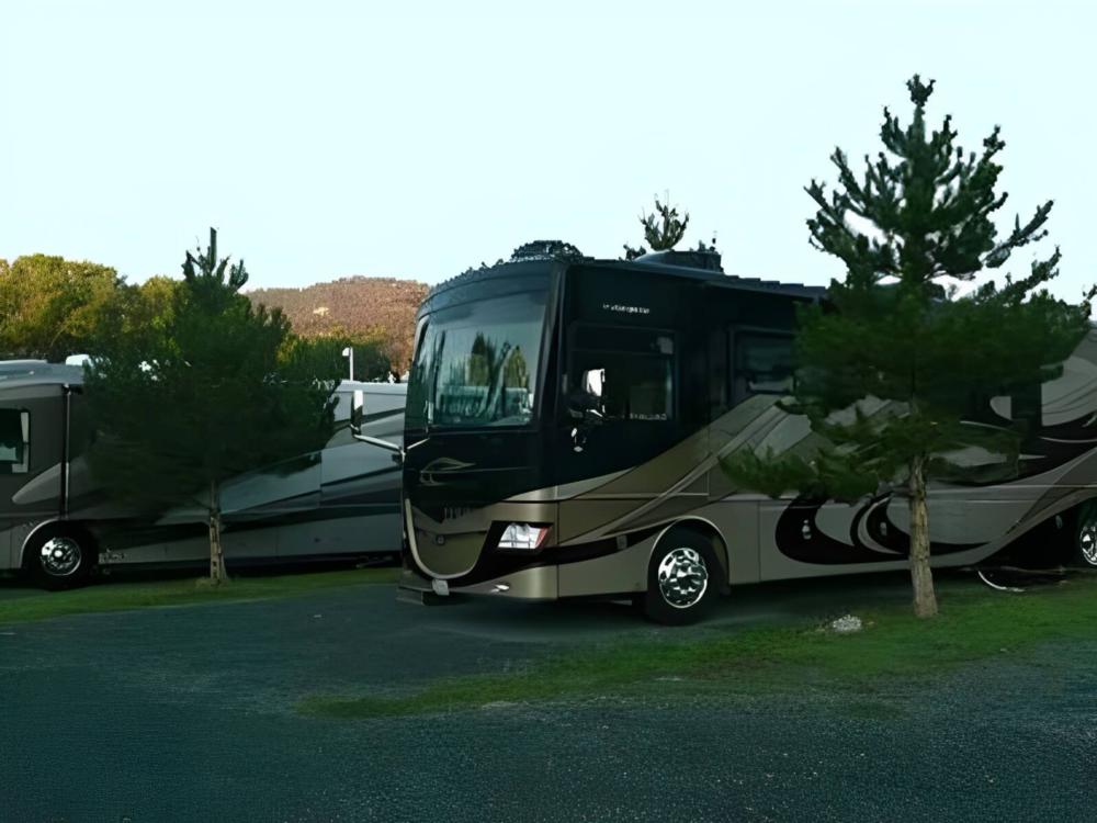 RV's parked at site Along the River RV Park