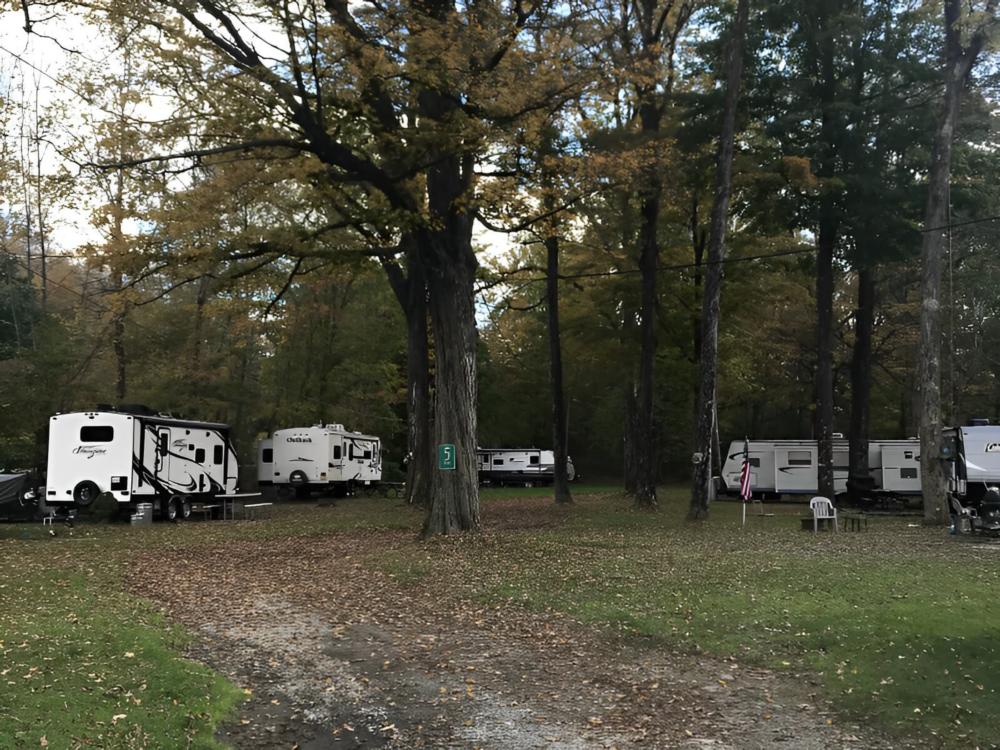 Parked trailers at site Butternut Grove Campsites