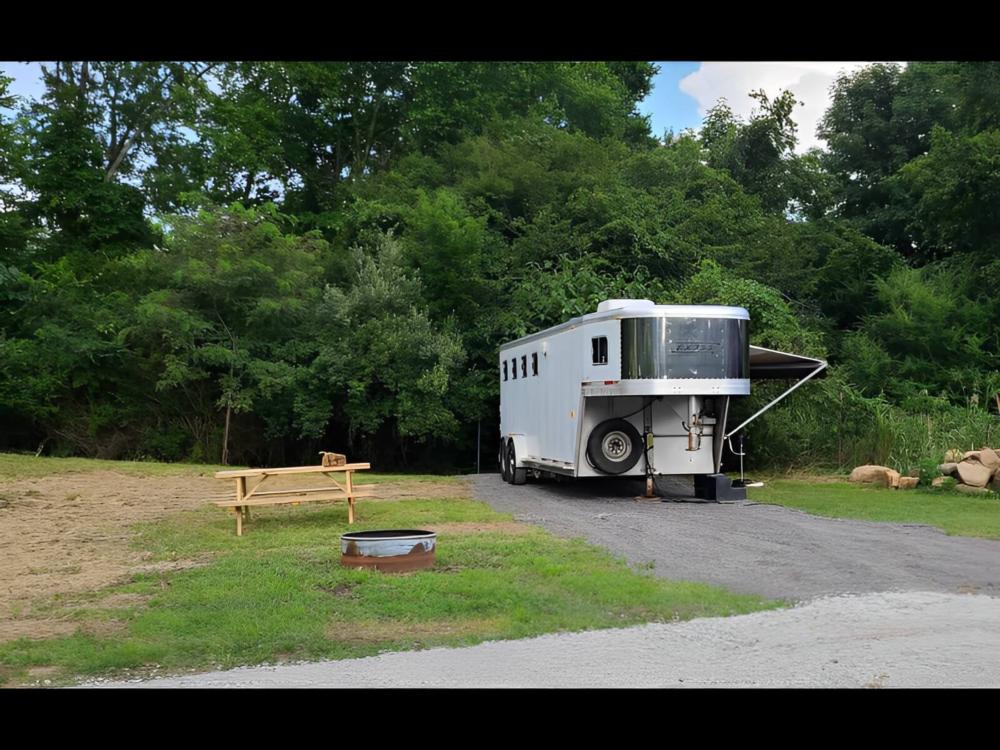 Parked travel trailer at Rock Bottom Horse Camp