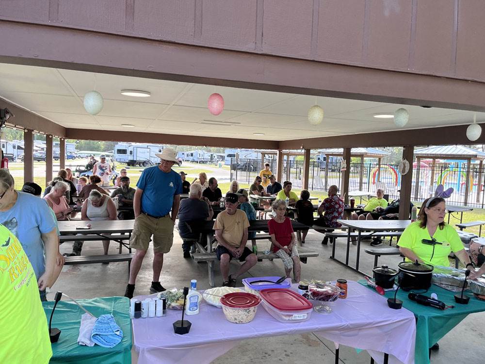 People gathered under the pavilion
