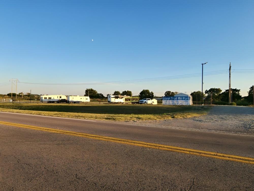 Parked travel trailers at Silver Trail RV Park at Lake Durant