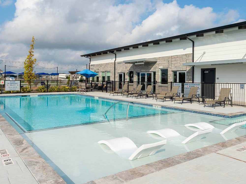 The pool and lounge chairs at JETSTREAM RV RESORT AT THE MED CENTER