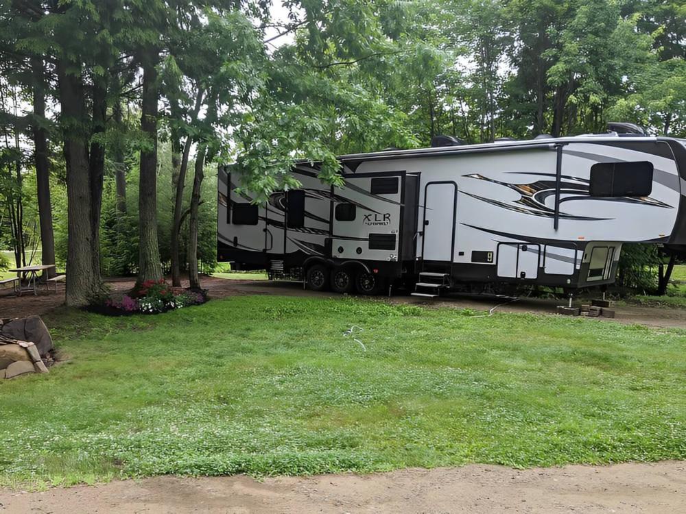 Parked trailer at site Cole's Mine RV Resort and Campground