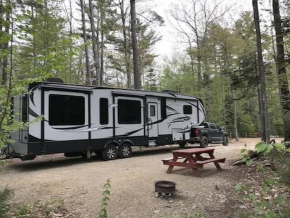 5th wheel in RV site at Coos Canyon Campground and Cabins