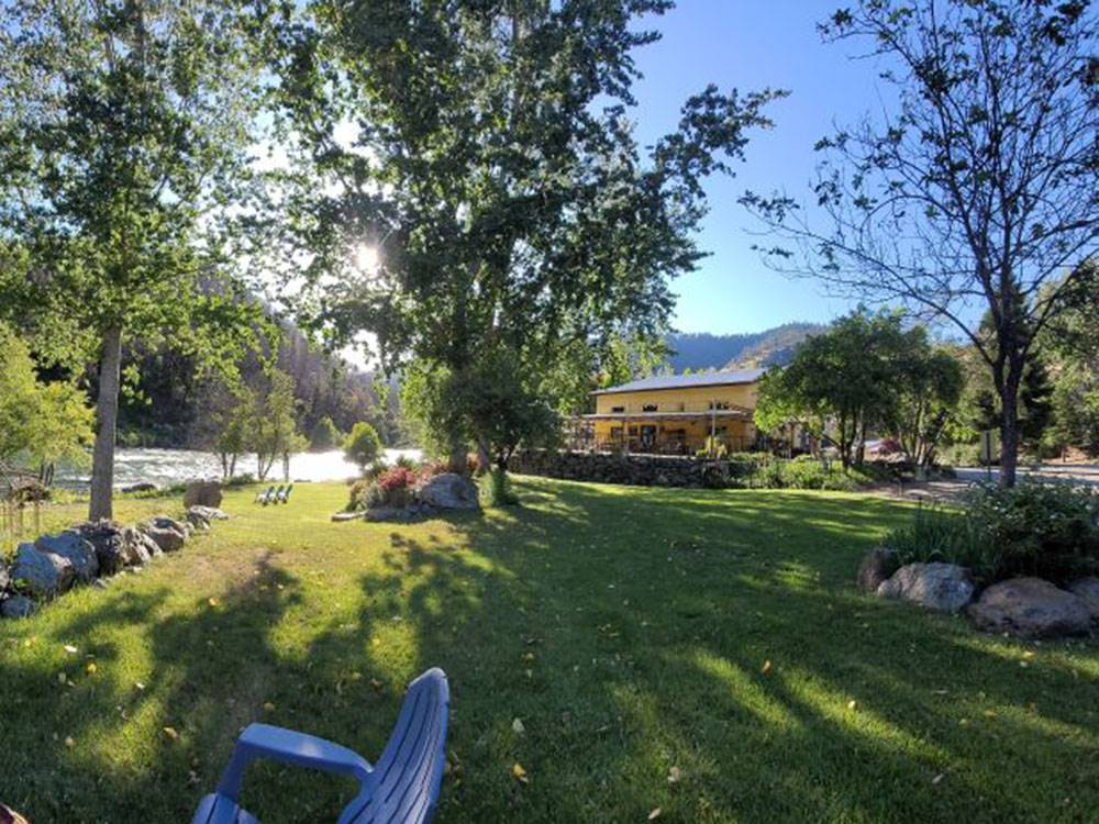 A view of the river from a grassy knoll