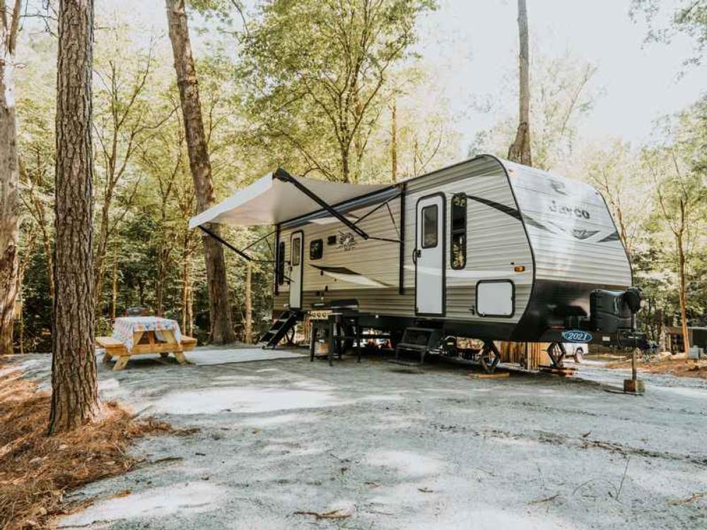 Trailer in RV site at Ted & Tracy's RV Campground