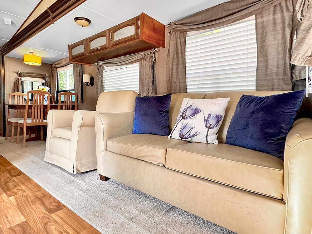 Interior of a motorhome main sitting room at VACAY VILLAGE OF PENSACOLA