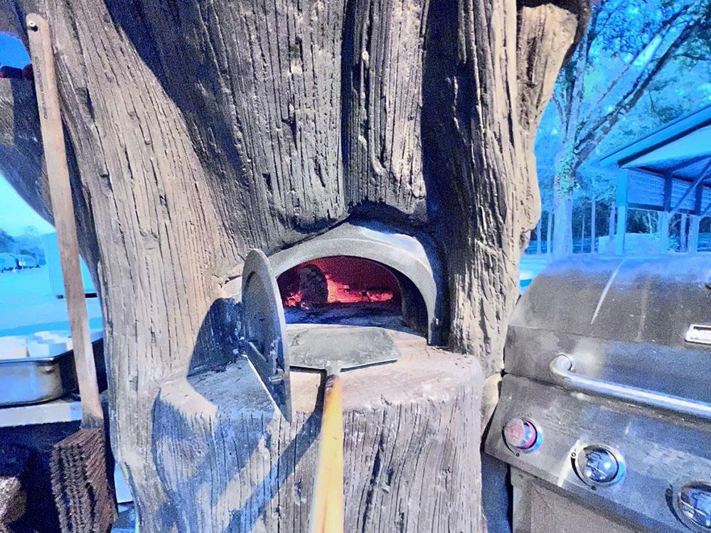 An outdoor pizza oven at VACAY VILLAGE OF PENSACOLA