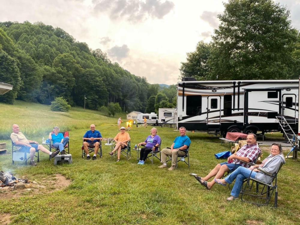 Group of RVers by a campfire at Mountain View RV Park - Roan Mountain