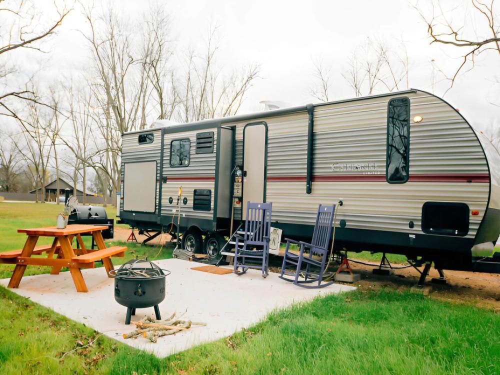 Site with picnic table and rocking chairs
