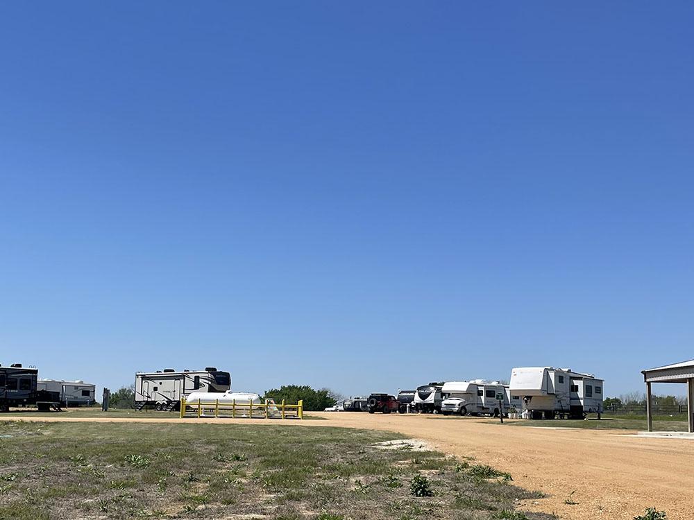 Travel trailers parked in RV sites at NATURE TRAILS STAYCATION
