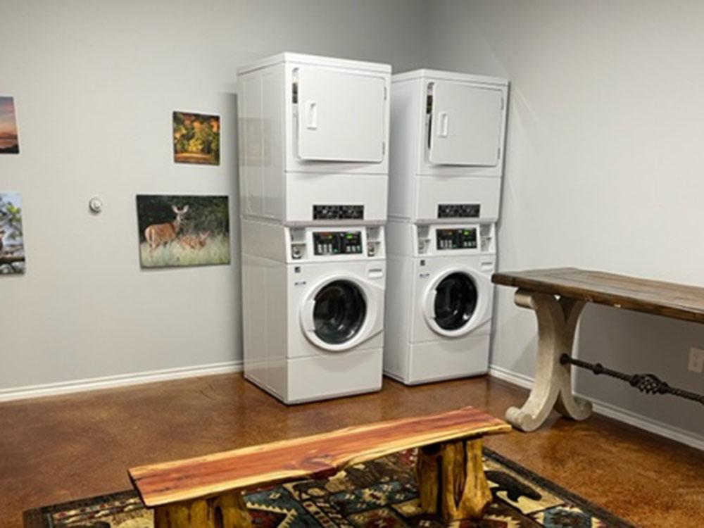 Stackable washer and dryers in the laundry room at NATURE TRAILS STAYCATION