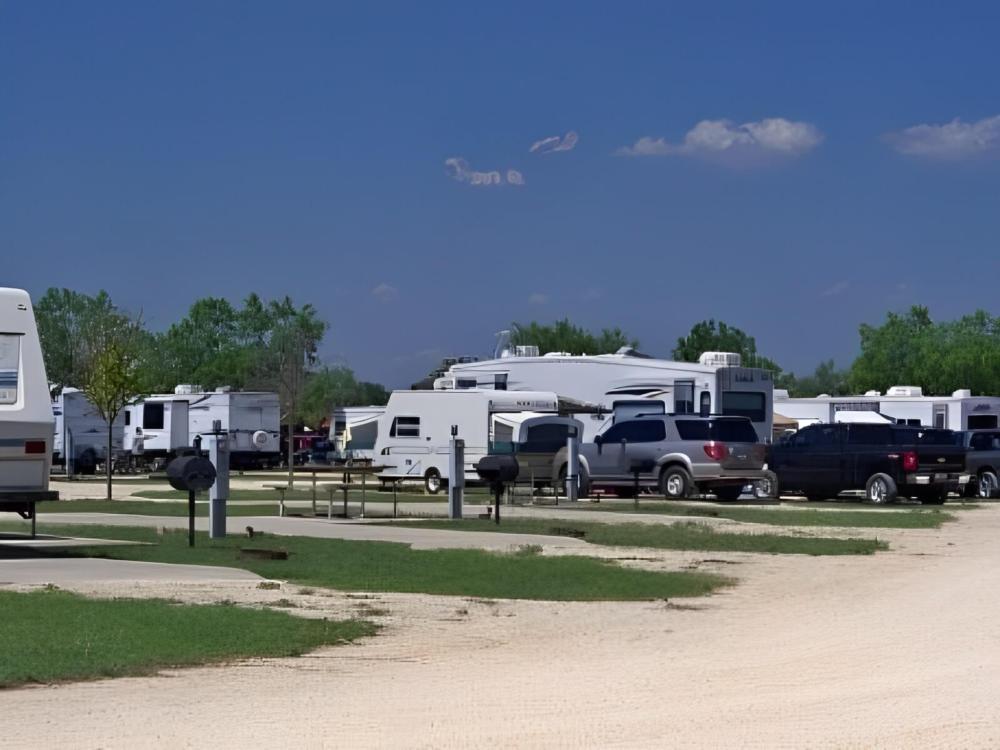 Parked RV's at Nueces River RV and Cabin Resort