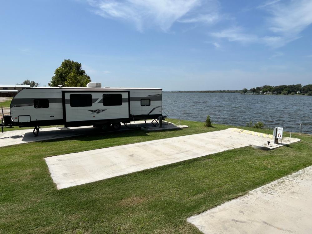 Open RV space at site Oasis Lake Buchanan
