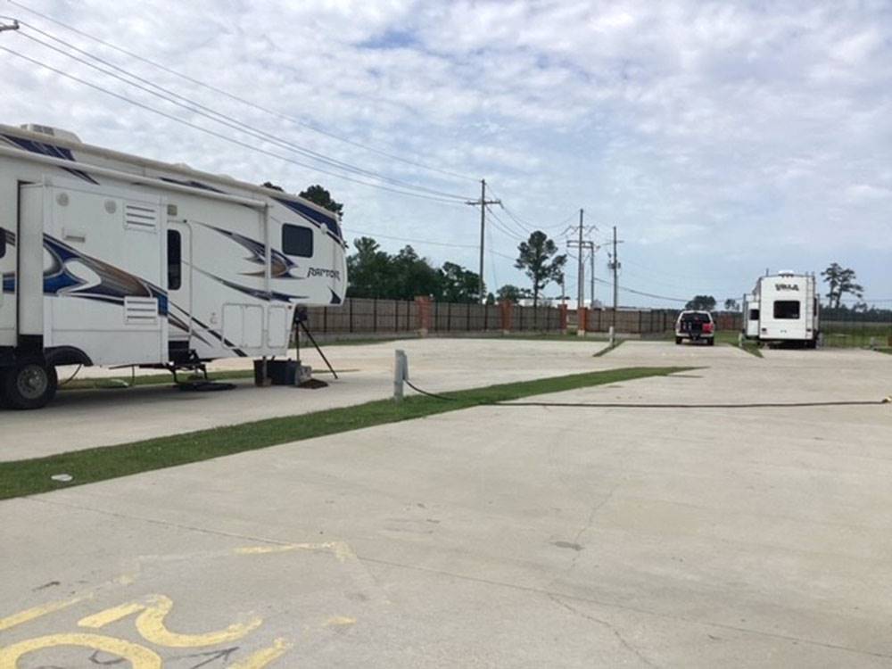 A fifth wheel parked at a site at Gator RV Park