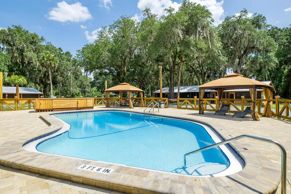 Parked RV at site Idlewild Lodge & RV Park