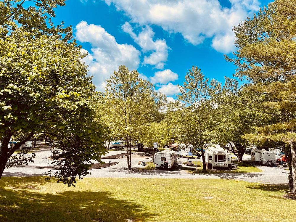 Lawn near RV sites at PIPESTEM RV PARK AND CAMPGROUND