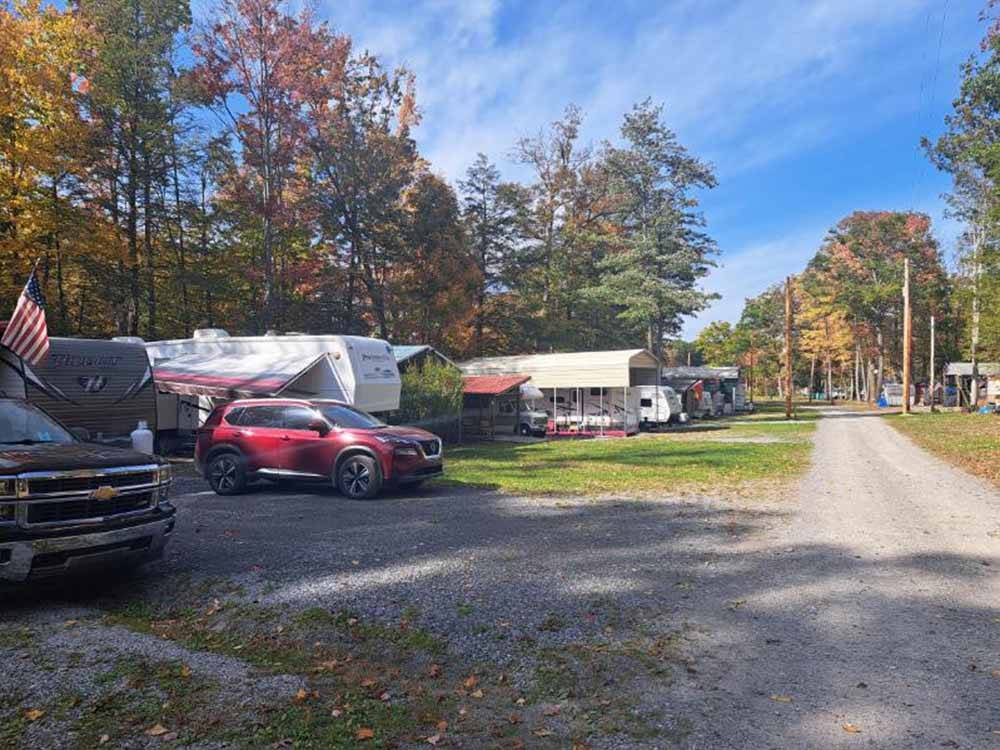 Cars and trailers in gravel sites at GLENDALE VALLEY CAMPGROUND