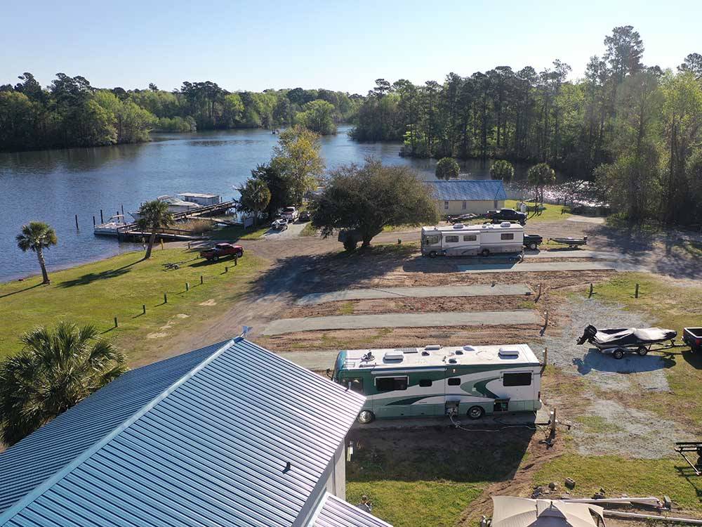 An aerial view of some sites near the water at BELLS MARINA RV RESORT