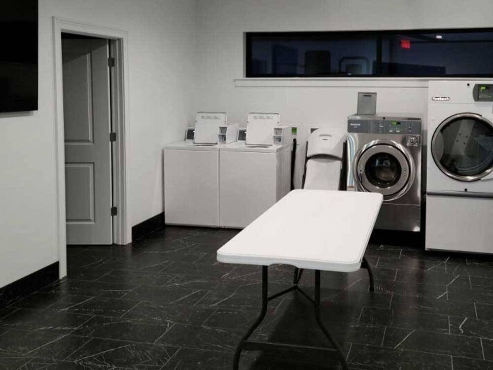 Inside of the very clean laundry room at FINISH LINE RV PARK