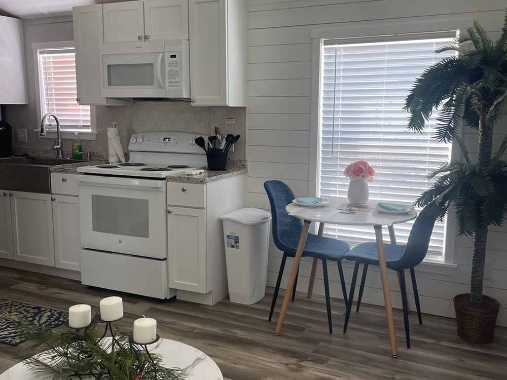 A view of the kitchen of the park model at TRAILBLAZER RV VILLAGE