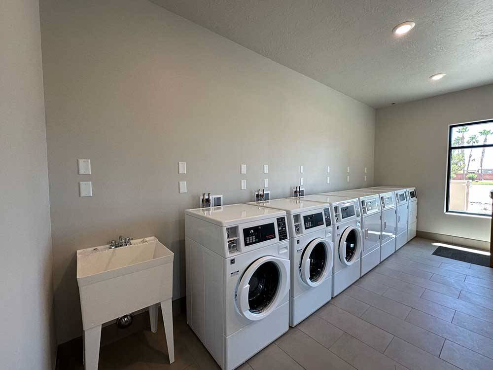 Inside of the clean laundry room at MESQUITE TRAILS RV RESORT