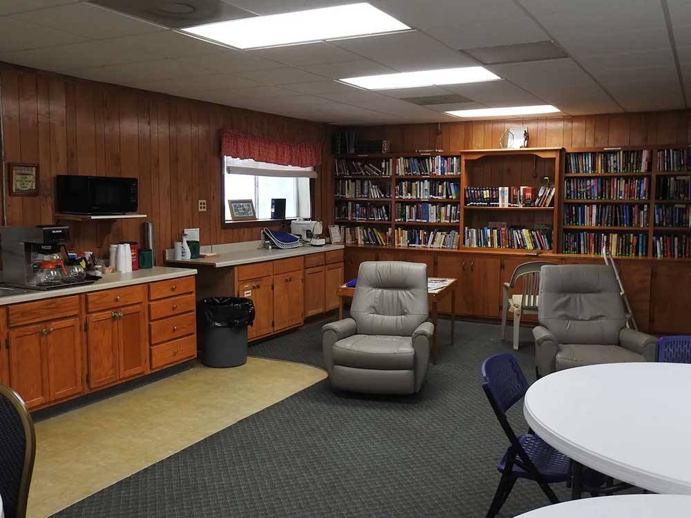 The coffee station and library at RIO VALLEY ESTATES 55+ MOBILE/RV PARK