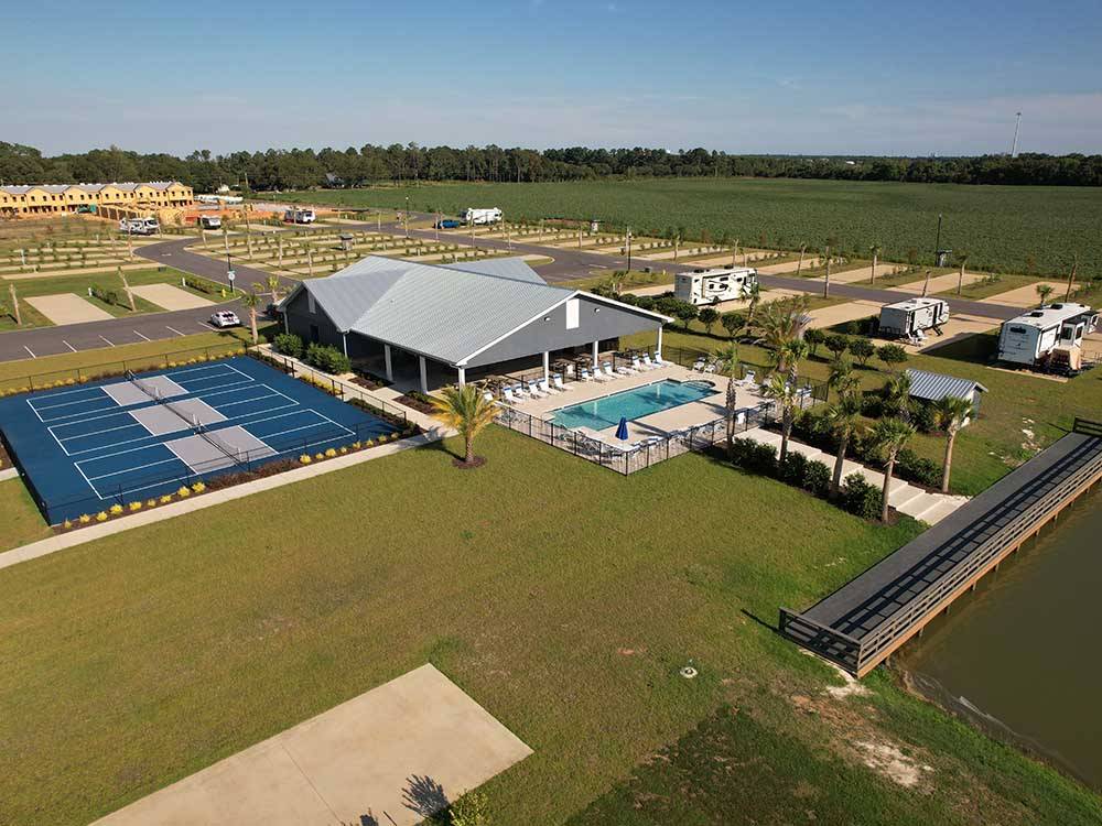 Aerial view of the office, swimming pool and shuffleboard courts at GRAND RIVIERA RV RESORT