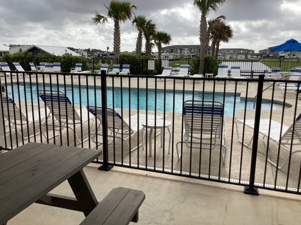 Pool side loungers at Grand Riviera RV Resort