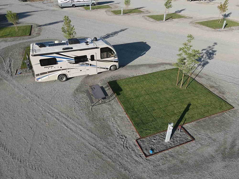 Aerial view of a RV in a site at WHISPERING RIVER RANCH RV PARK